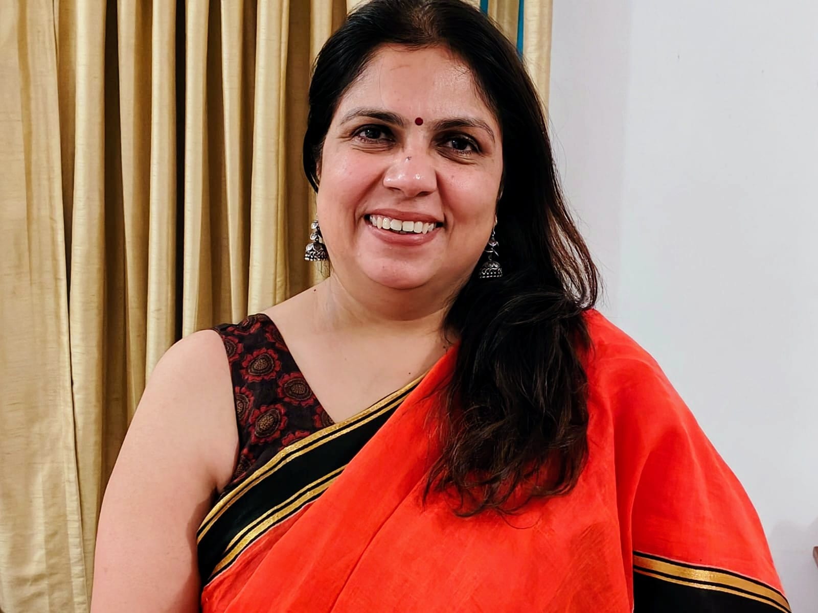 Rashmi smiling